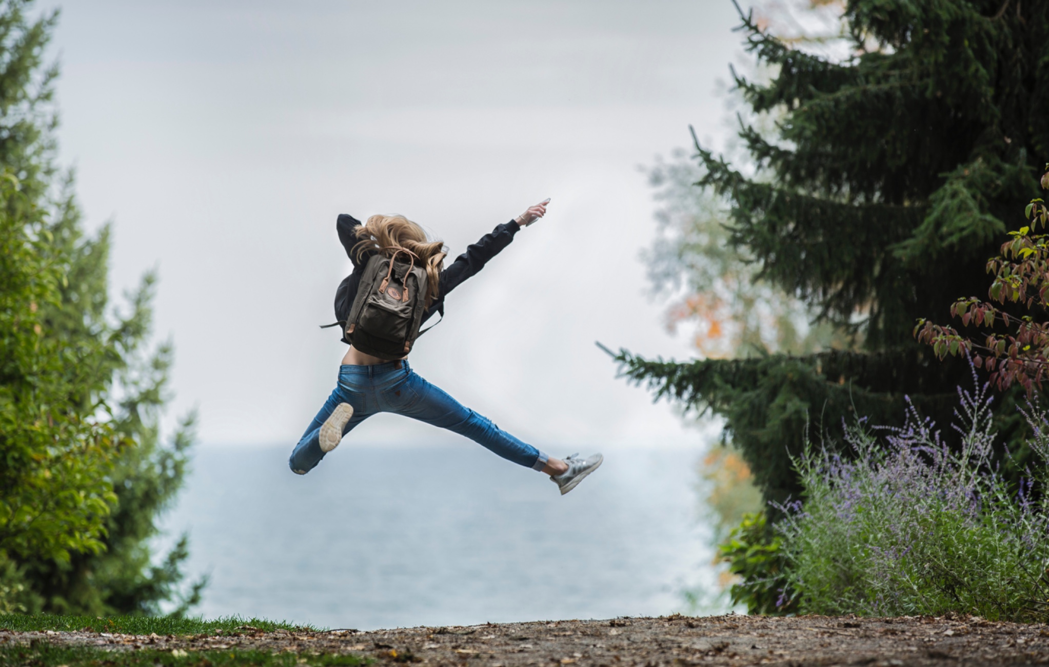 Excited woman jumping