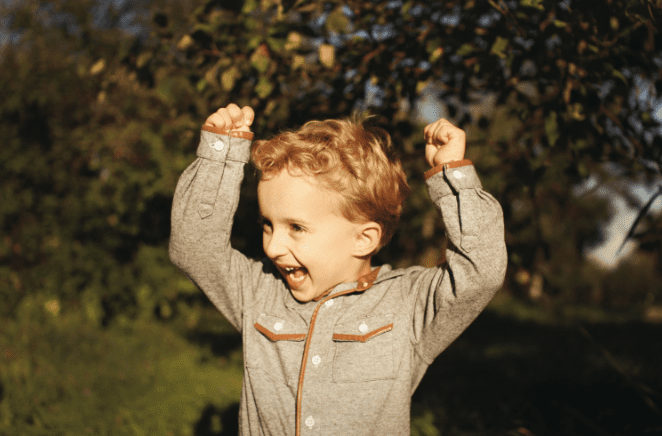 excited kid outside